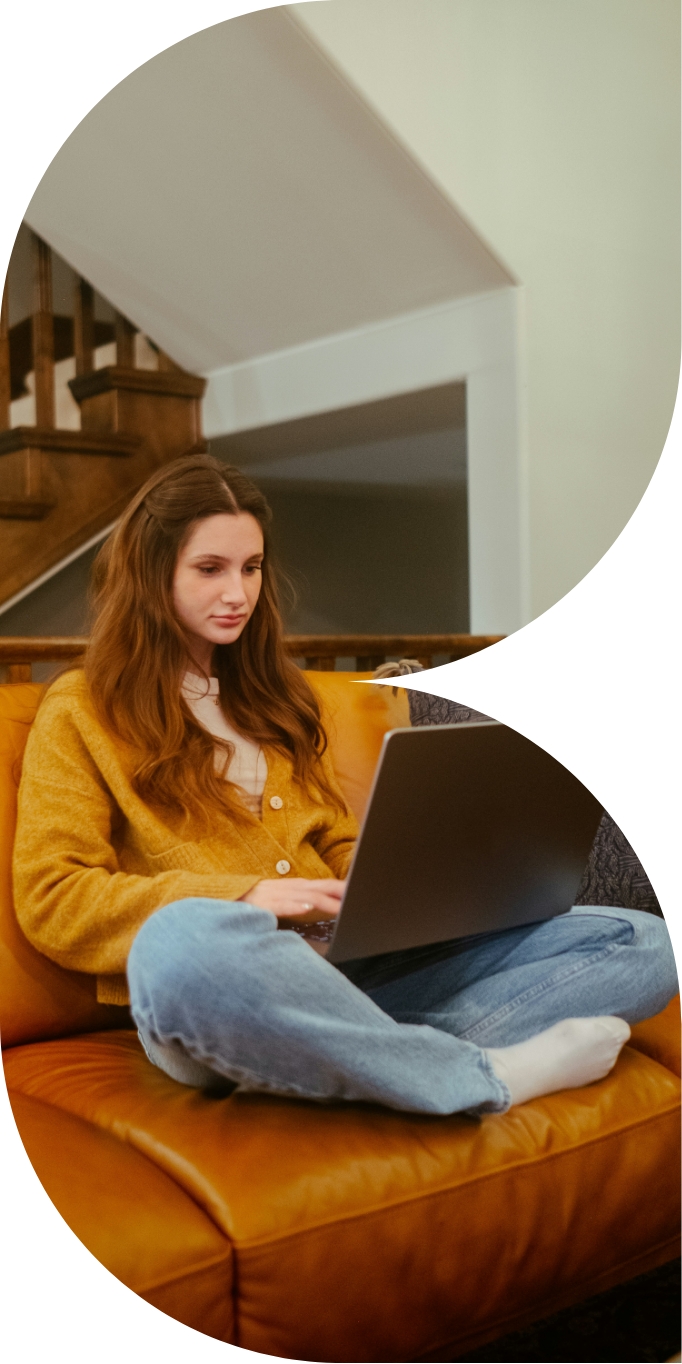 Woman sitting down with laptop